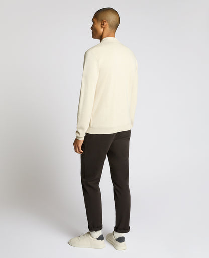 Man wearing a sand Long Sleeve Cotton Knit Polo