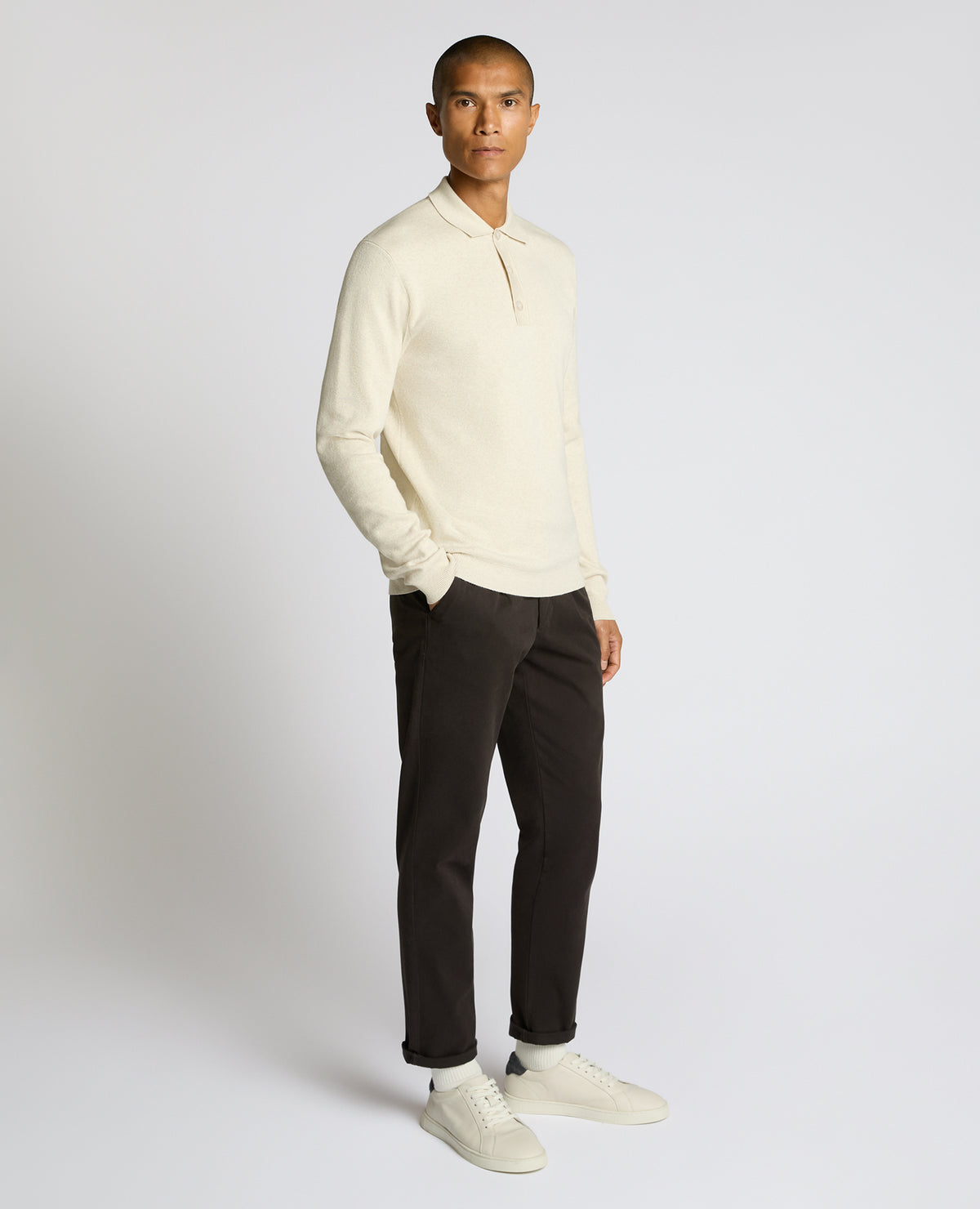 Man wearing a sand Long Sleeve Cotton Knit Polo