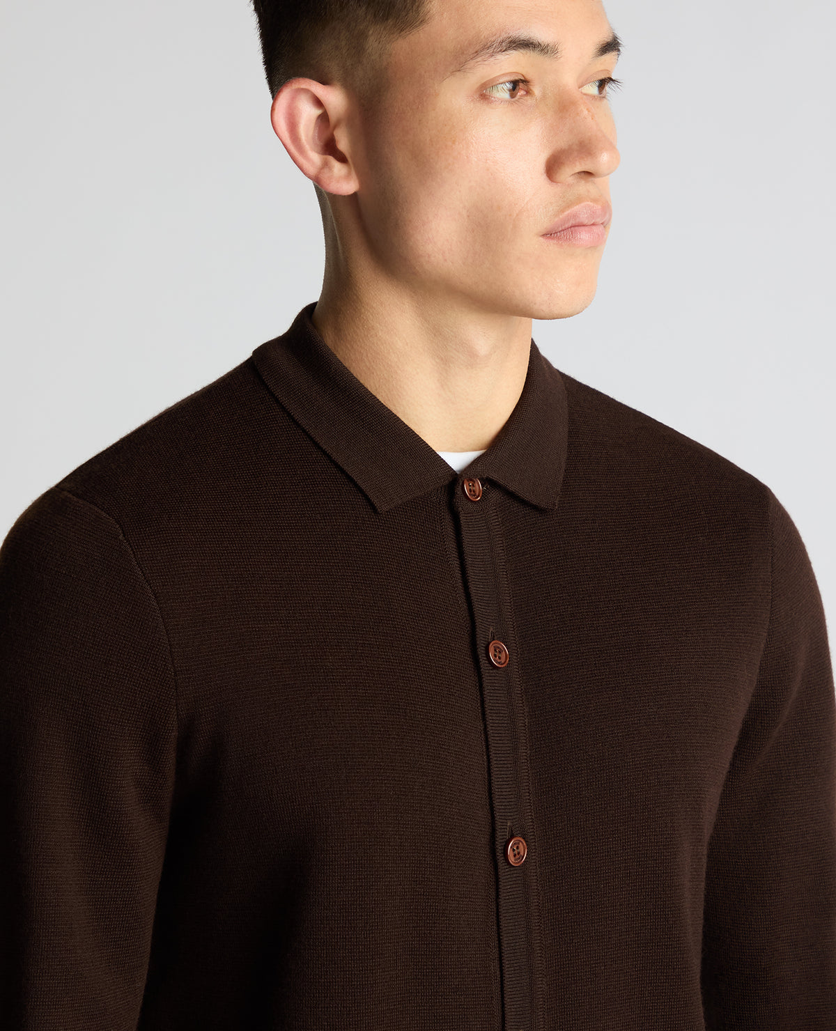 Man wearing a brown Tapered Fit Fit Long Sleeve Cardigan