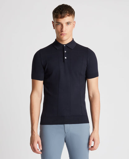 Man wearing a navy Slim Fit Knitted Cotton Short-Sleeve Polo