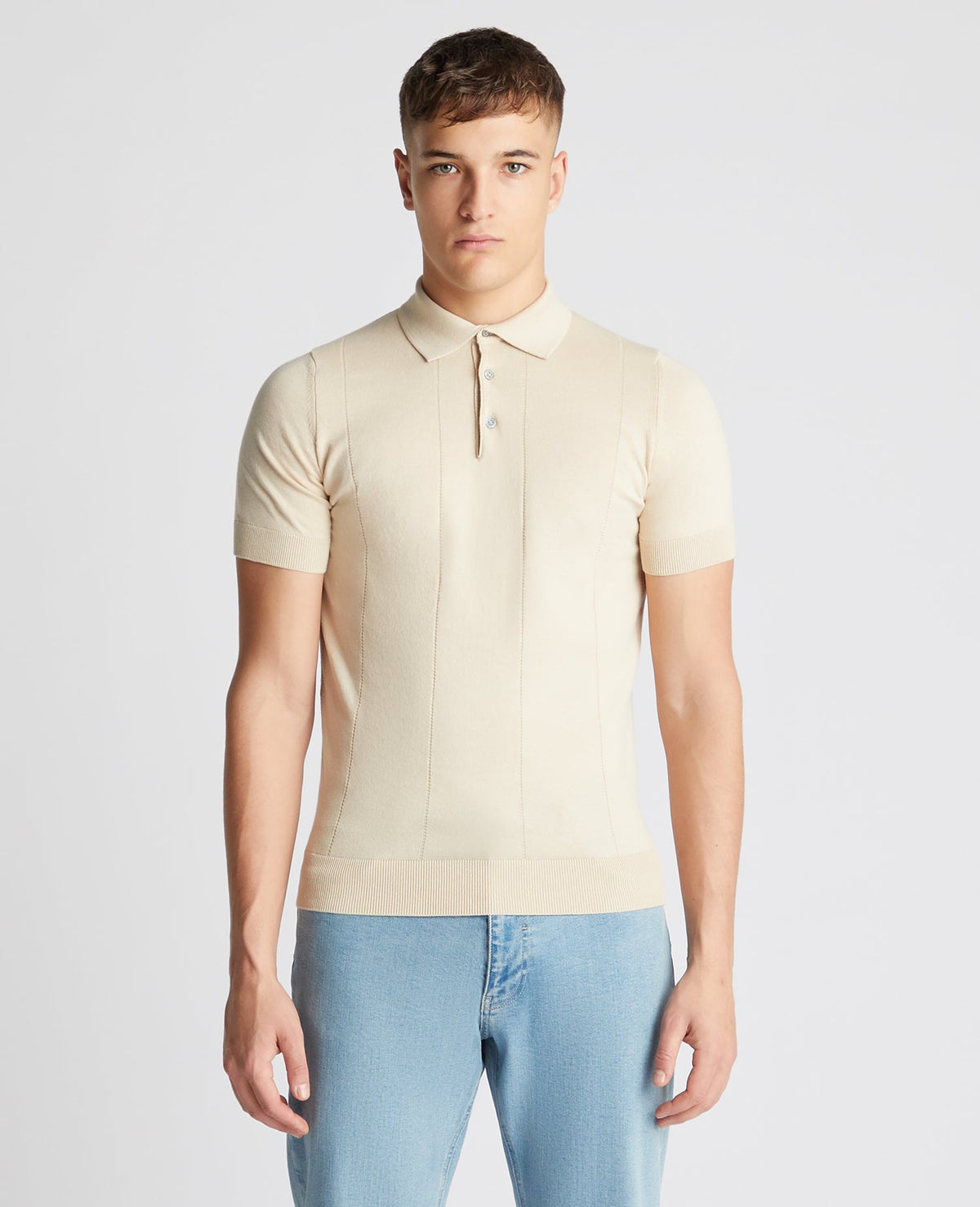 Man wearing a sand Slim Fit Knitted Cotton Short-Sleeve Polo