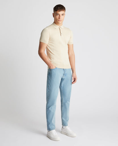 Man wearing a sand Slim Fit Knitted Cotton Short-Sleeve Polo