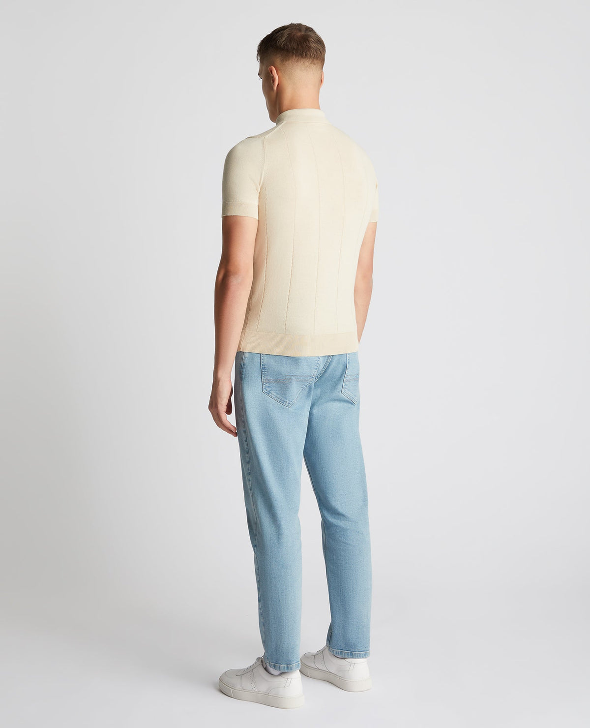 Man wearing a sand Slim Fit Knitted Cotton Short-Sleeve Polo