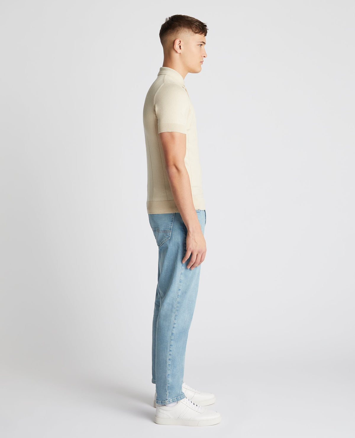 Man wearing a sand Slim Fit Knitted Cotton Short-Sleeve Polo