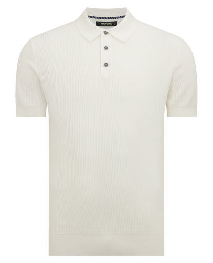 Man wearing a white Slim Fit Cotton Interest Fabric Polo Shirt