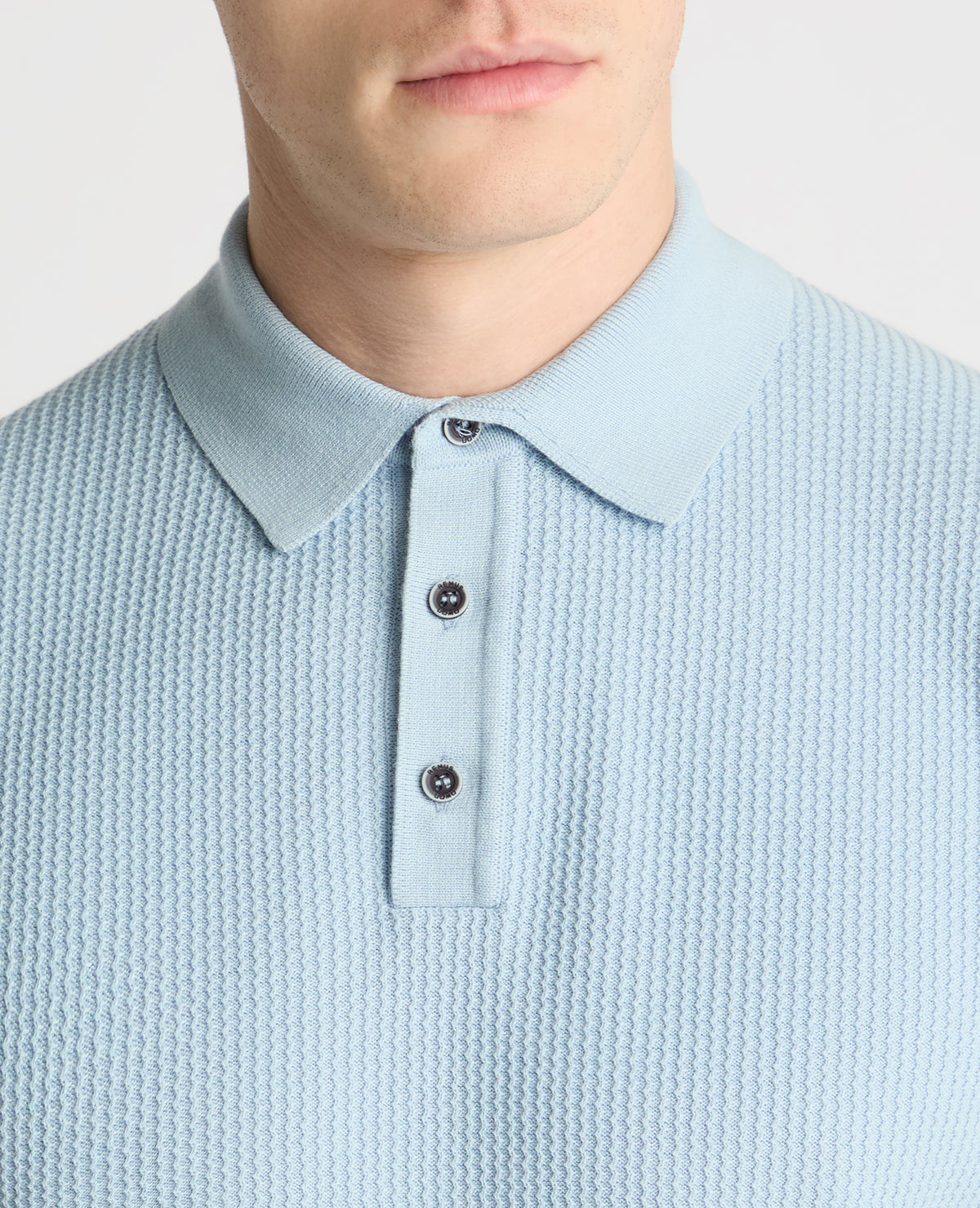 Man wearing a blue jumper