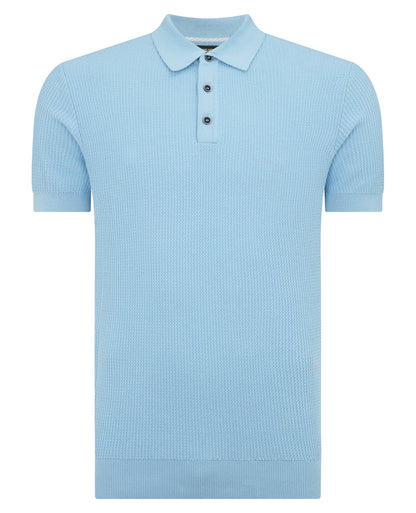 Man wearing a blue Slim Fit Cotton Interest Fabric Polo Shirt