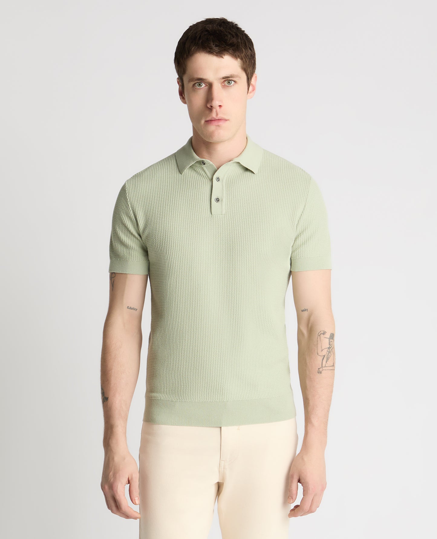 Man wearing a green jumper