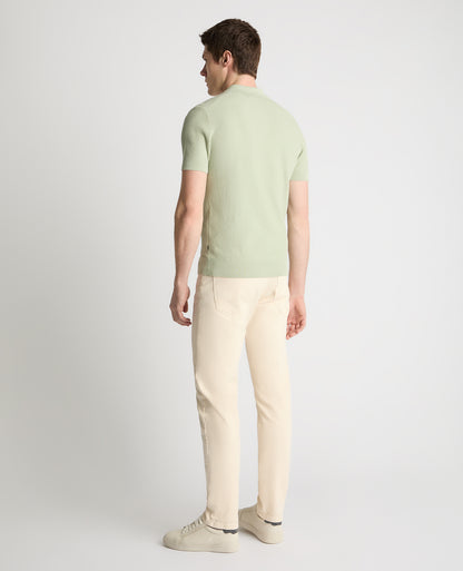 Man wearing a green jumper