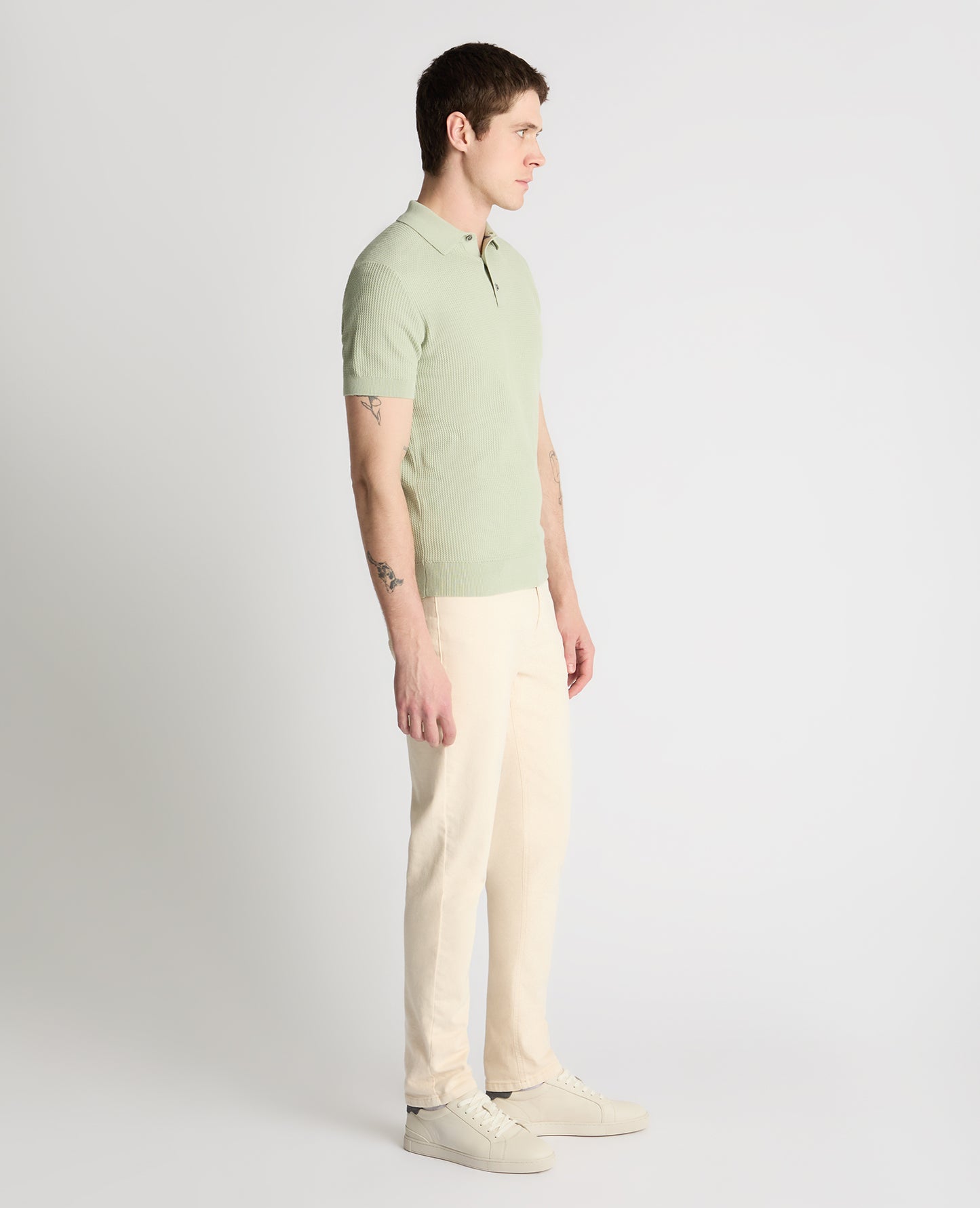 Man wearing a green jumper