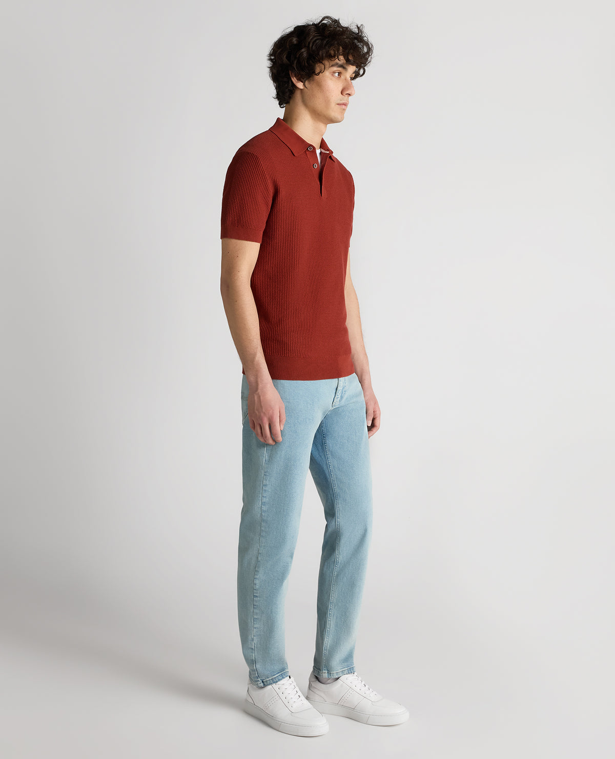 Man wearing a orange Slim Fit Cotton Interest Fabric Polo Shirt