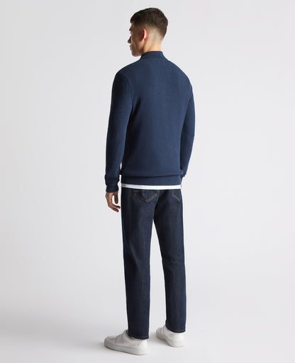 Man wearing a blue Tapered Fit Cotton Half Zip Sweater