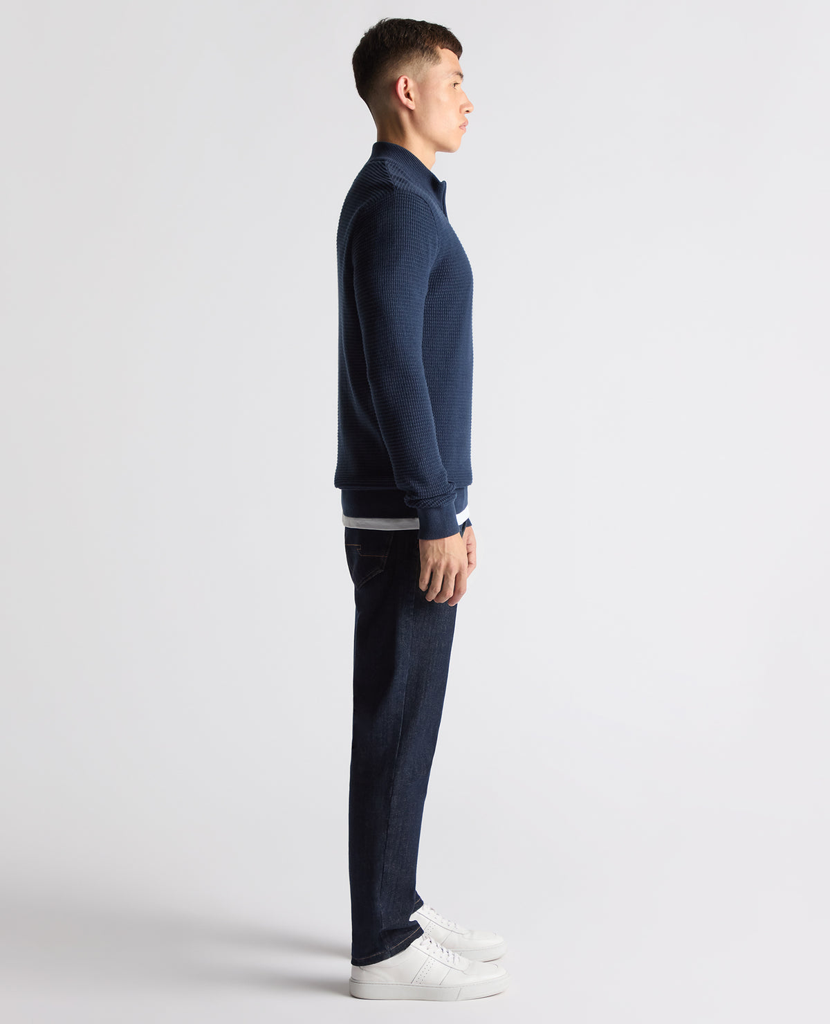 Man wearing a blue Tapered Fit Cotton Half Zip Sweater