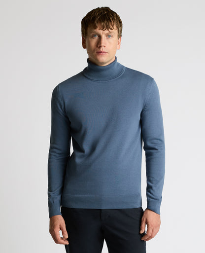 Man wearing a blue Roll Neck Cotton Sweater