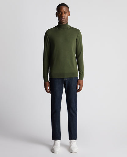 Man wearing a green Tapered Fit Roll Neck Sweater