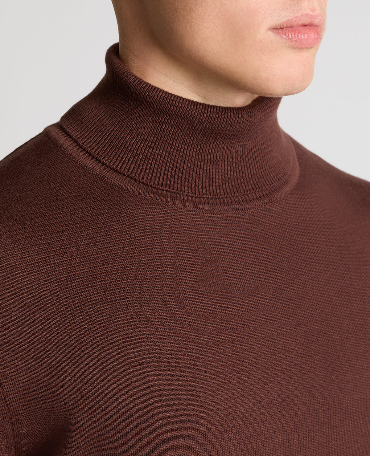Man wearing a brown Roll Neck Cotton Sweater