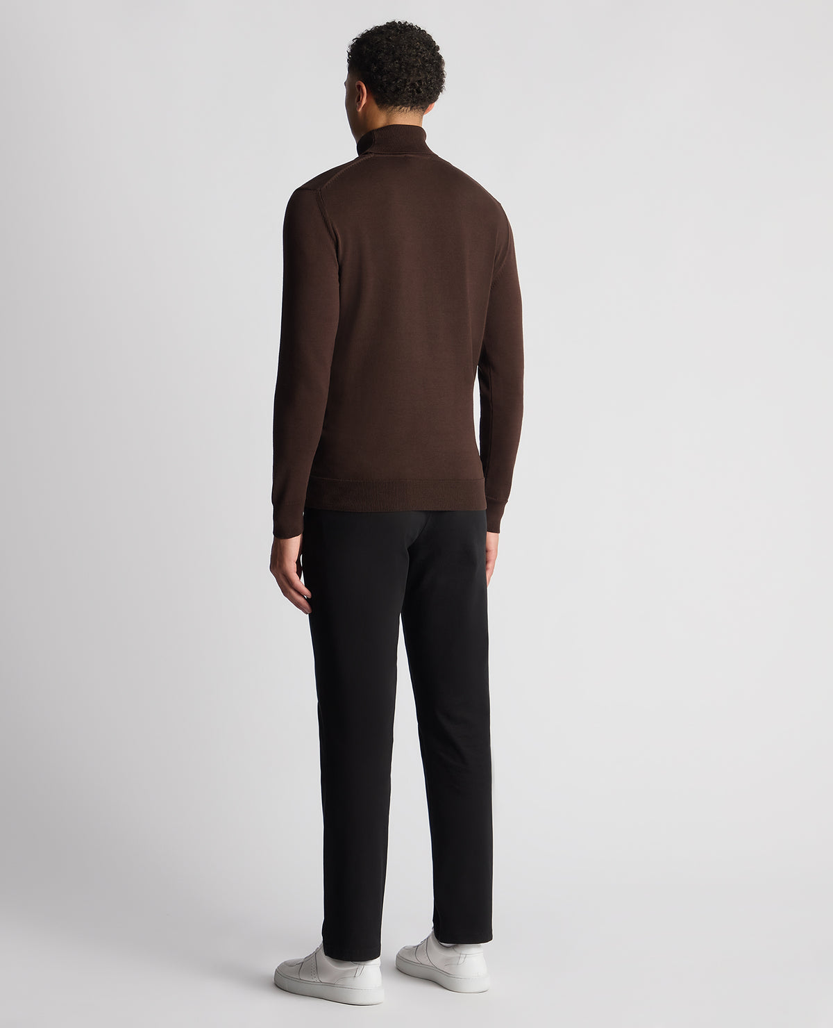 Man wearing a brown Tapered Fit Roll Neck Sweater