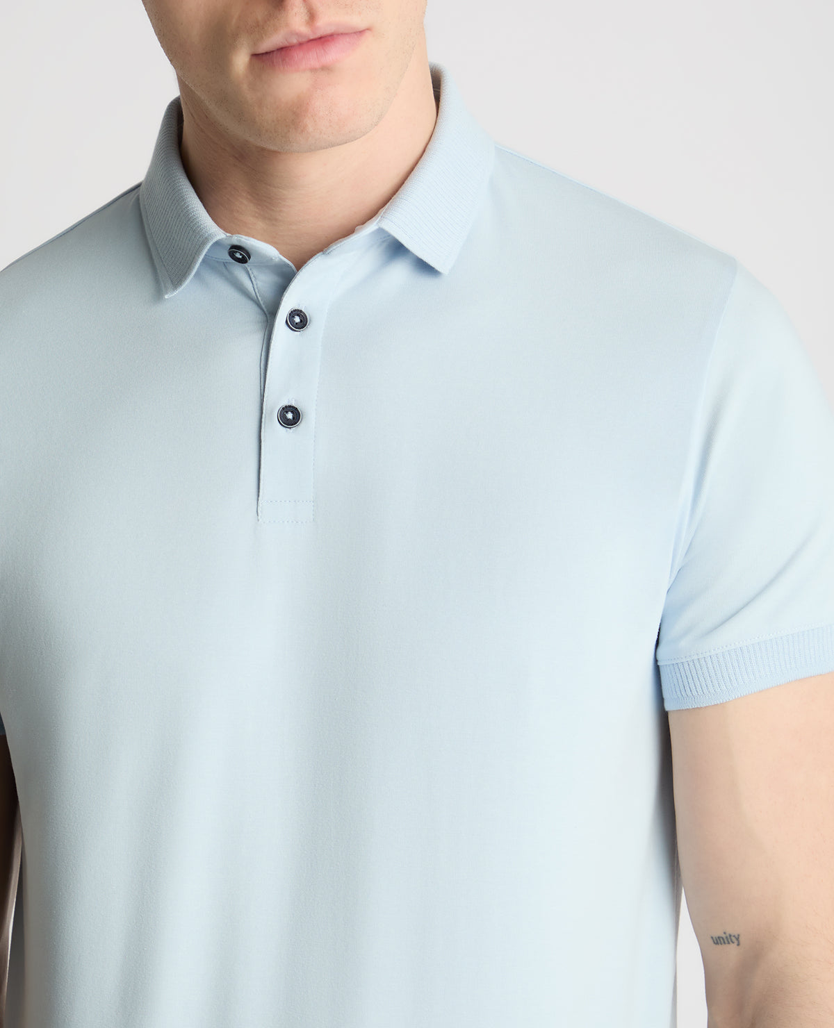 Man wearing a blue jumper