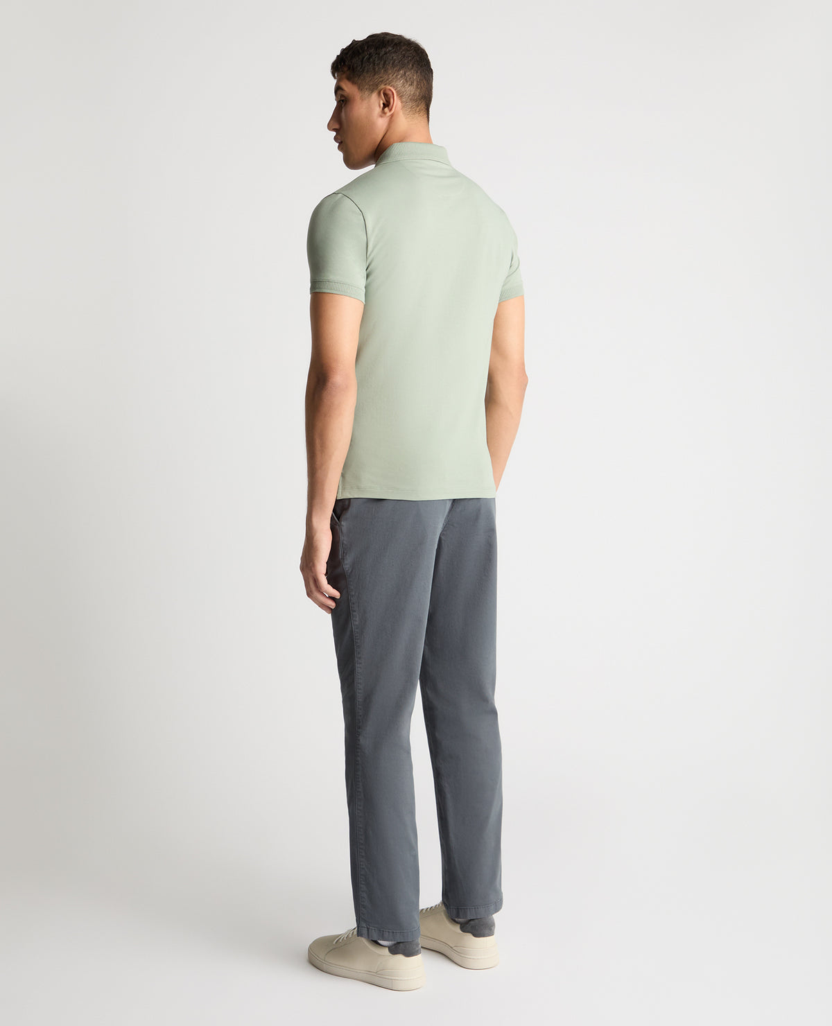 Man wearing a green jumper