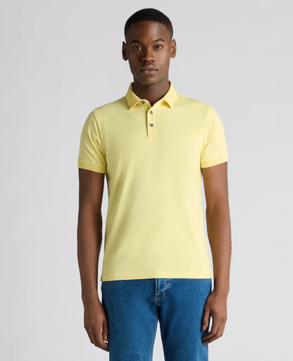 Man wearing a orange Tapered Fit Cotton-Stretch Polo Shirt