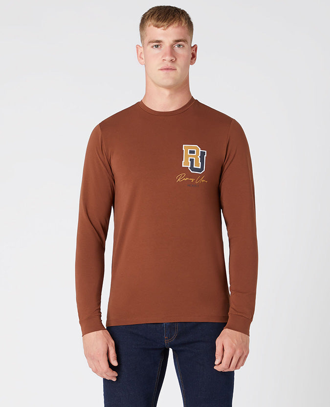 Man wearing a brown Tapered Fit Cotton-Stretch T-Shirt
