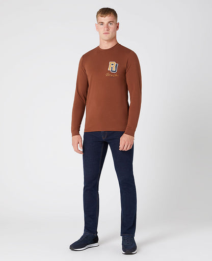 Man wearing a brown Tapered Fit Cotton-Stretch T-Shirt