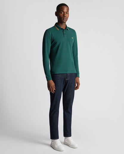 Man wearing a green Slim Fit Cotton-Stretch Pique Polo Shirt