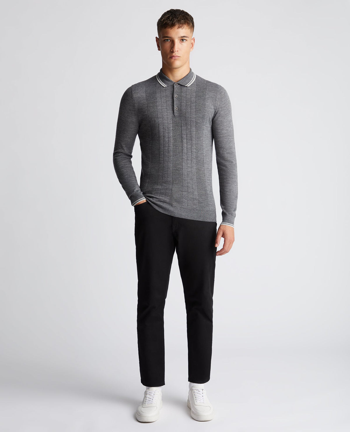 Man wearing a grey Slim Fit Merino Wool Knitted Polo