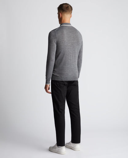 Man wearing a grey Slim Fit Merino Wool Knitted Polo