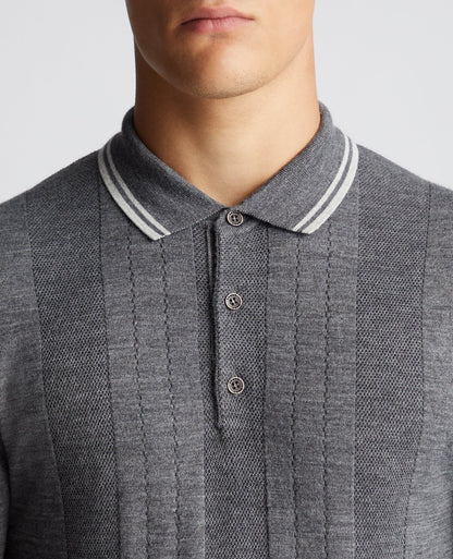 Man wearing a grey Slim Fit Merino Wool Knitted Polo