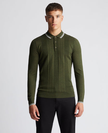 Man wearing a green Slim Fit Merino Wool-Blend Long Sleeve Knitted Polo