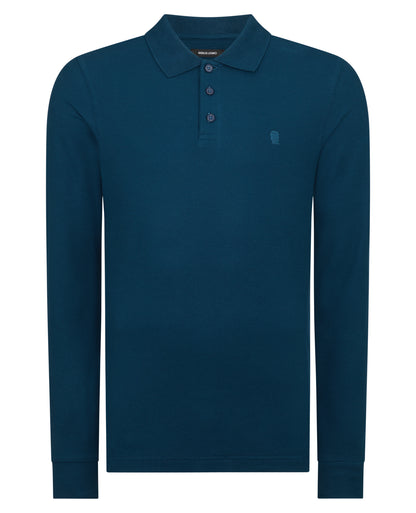 Man wearing a blue Slim Fit Cotton-Stretch Pique Polo Shirt