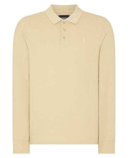Man wearing a sand Slim Fit Cotton-Stretch Pique Polo Shirt