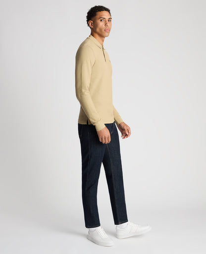 Man wearing a sand Slim Fit Cotton-Stretch Pique Polo Shirt
