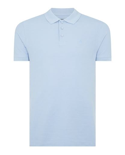 Man wearing a blue Tapered Fit Cotton Pique Polo Shirt