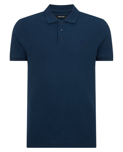 Man wearing a blue Tapered Fit Cotton Pique Polo Shirt