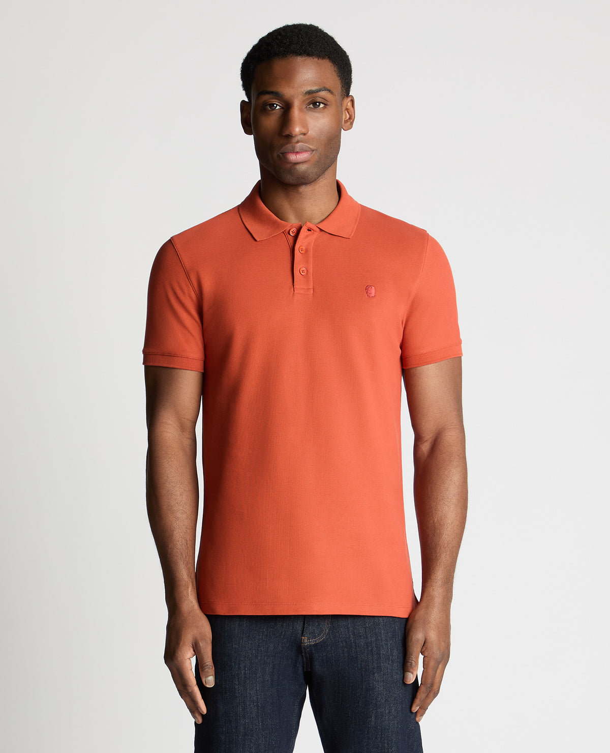 Man wearing a orange jumper