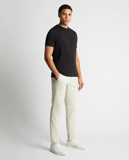 Man wearing a black Relaxed Fit Crew Neck Tencel T-Shirt