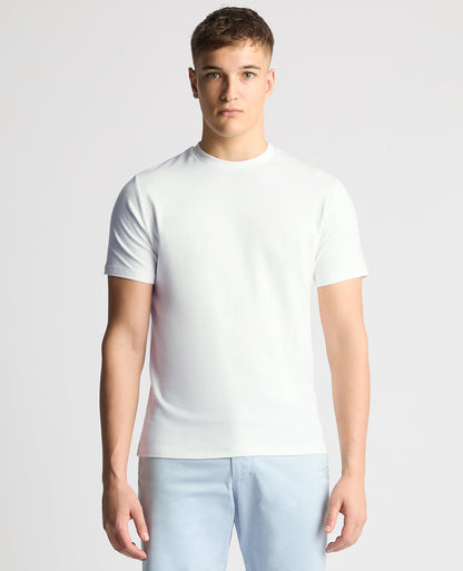 Man wearing a white Relaxed Fit Crew Neck Tencel T-Shirt