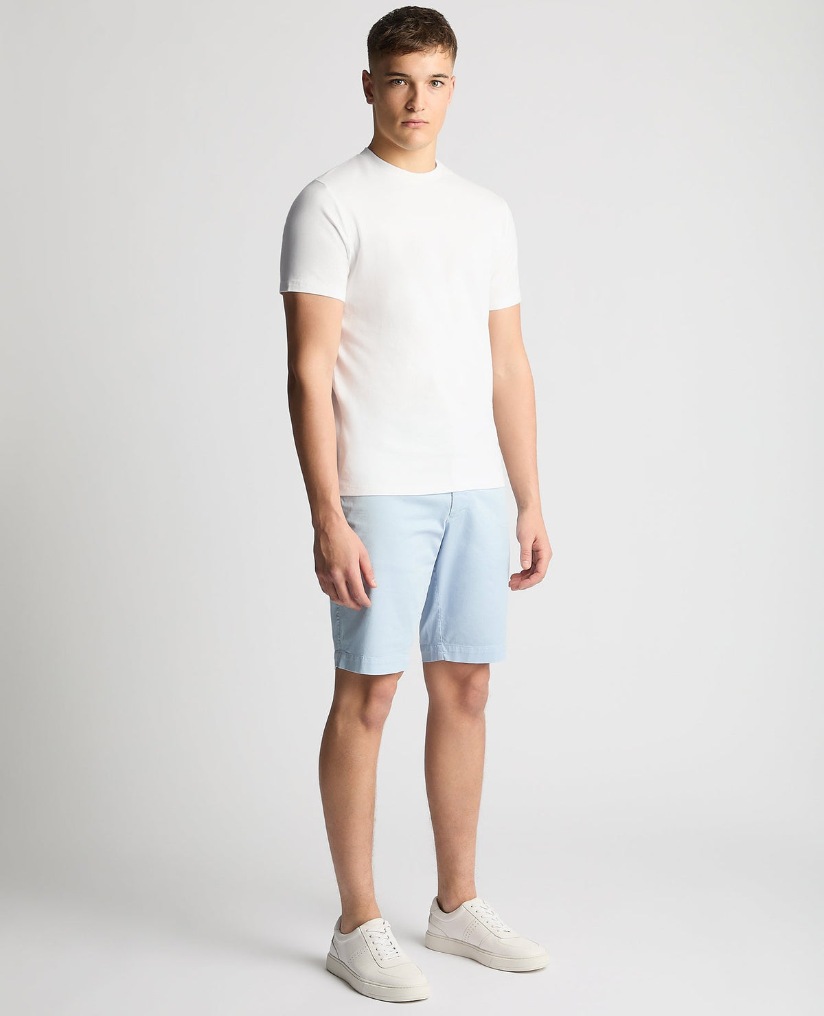 Man wearing a white Relaxed Fit Crew Neck Tencel T-Shirt
