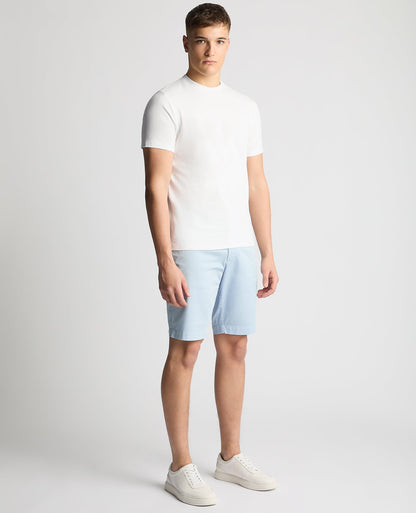 Man wearing a white Relaxed Fit Crew Neck Tencel T-Shirt