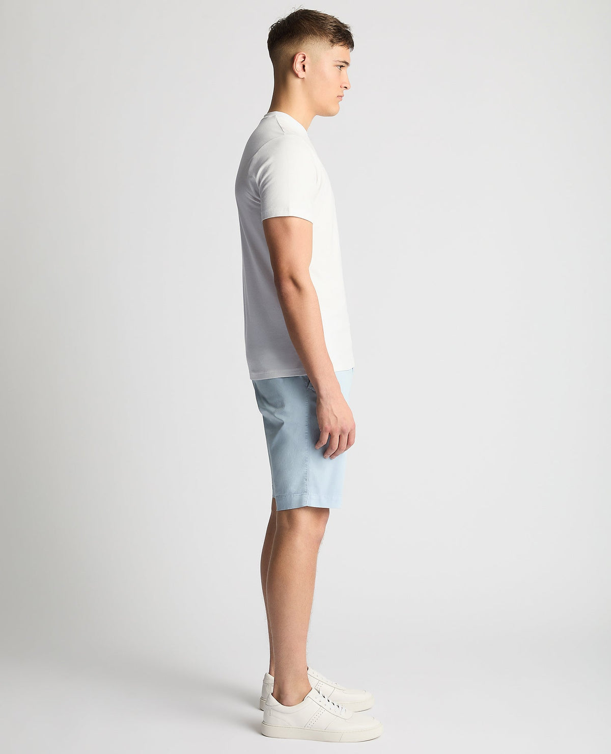 Man wearing a white Relaxed Fit Crew Neck Tencel T-Shirt