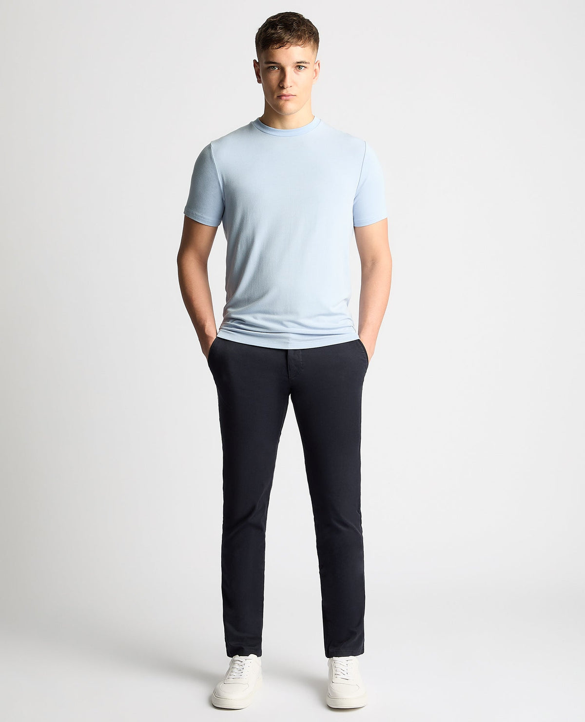 Man wearing a blue Relaxed Fit Crew Neck Tencel T-Shirt