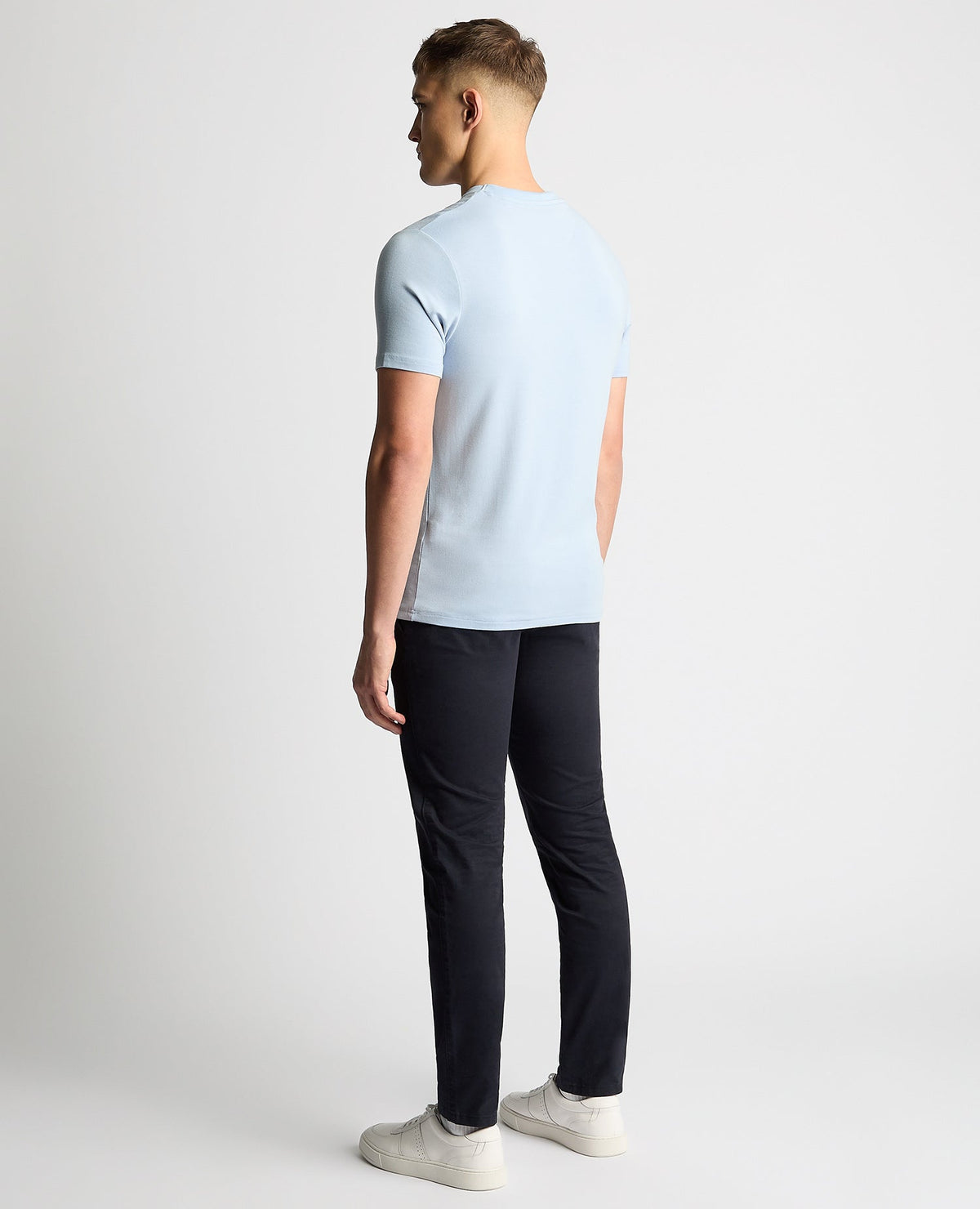 Man wearing a blue Relaxed Fit Crew Neck Tencel T-Shirt