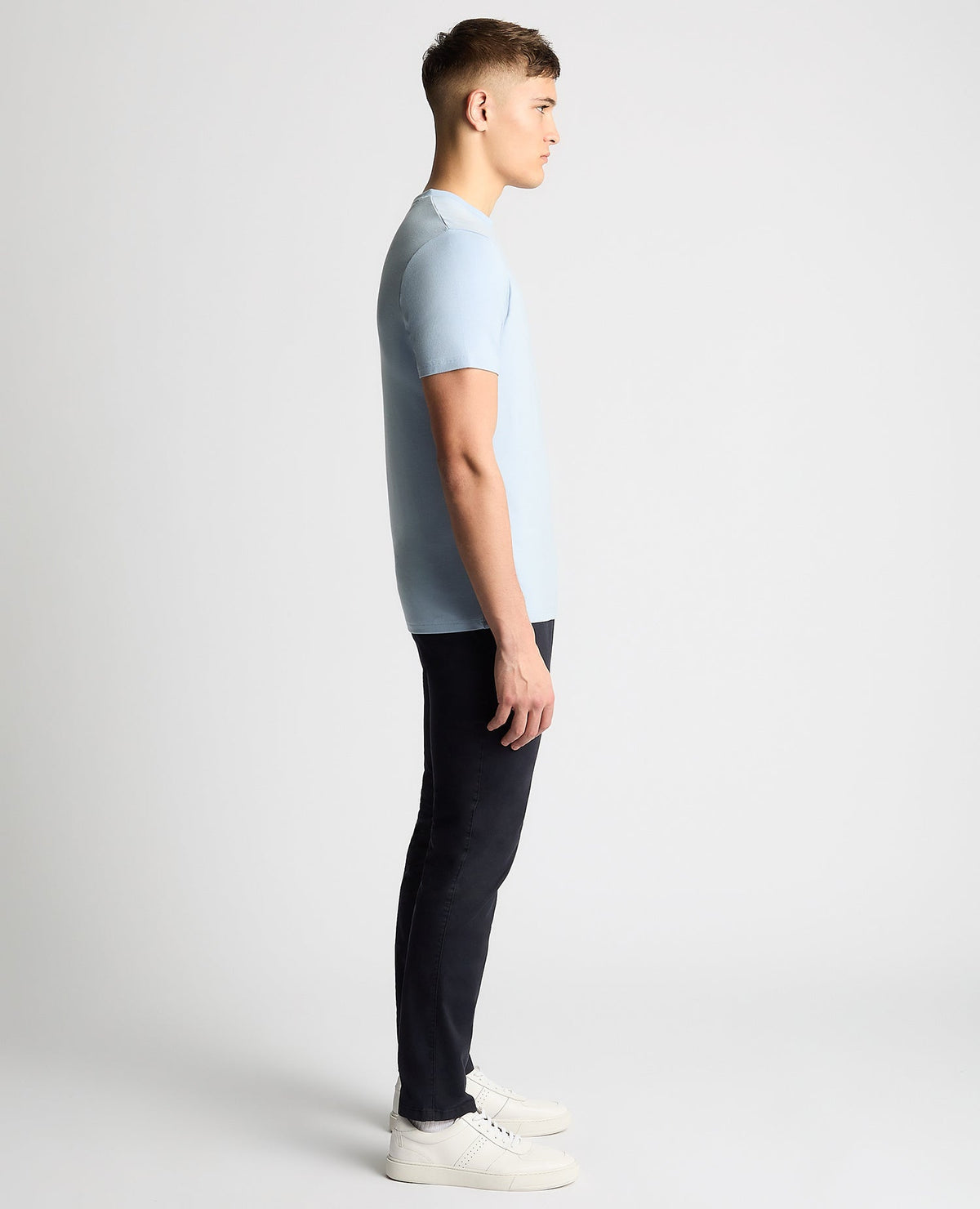 Man wearing a blue Relaxed Fit Crew Neck Tencel T-Shirt
