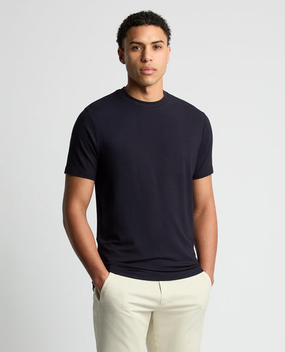 Man wearing a navy Relaxed Fit Crew Neck Tencel T-Shirt