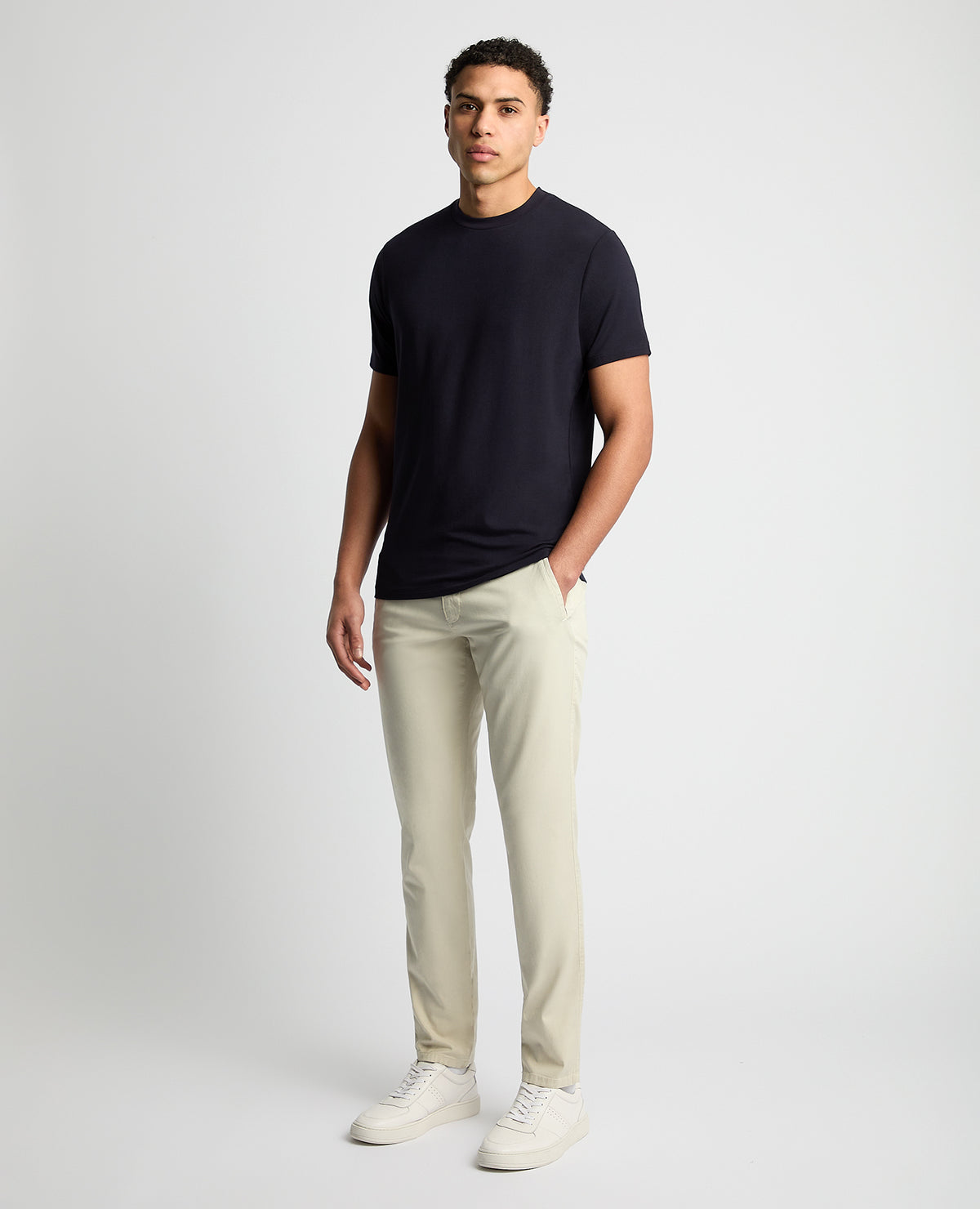 Man wearing a navy Relaxed Fit Crew Neck Tencel T-Shirt