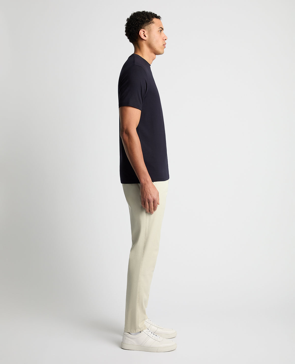 Man wearing a navy Relaxed Fit Crew Neck Tencel T-Shirt