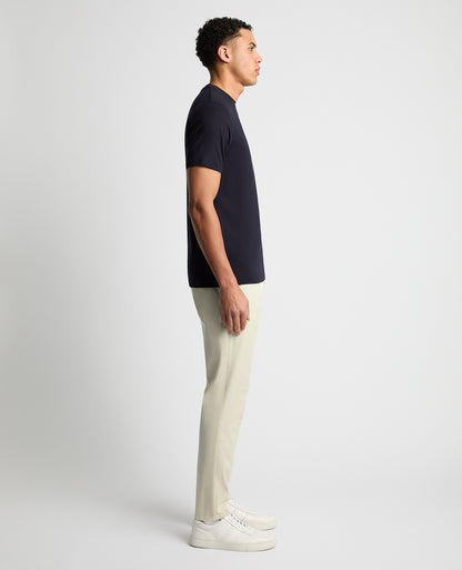 Man wearing a navy Relaxed Fit Crew Neck Tencel T-Shirt