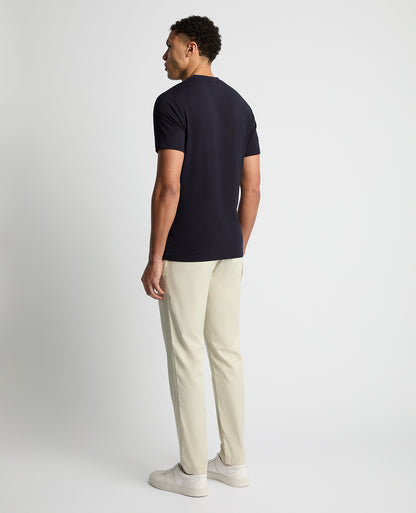 Man wearing a navy Relaxed Fit Crew Neck Tencel T-Shirt